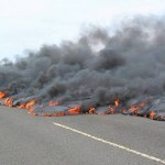 lava flow crosses Hawaiian road